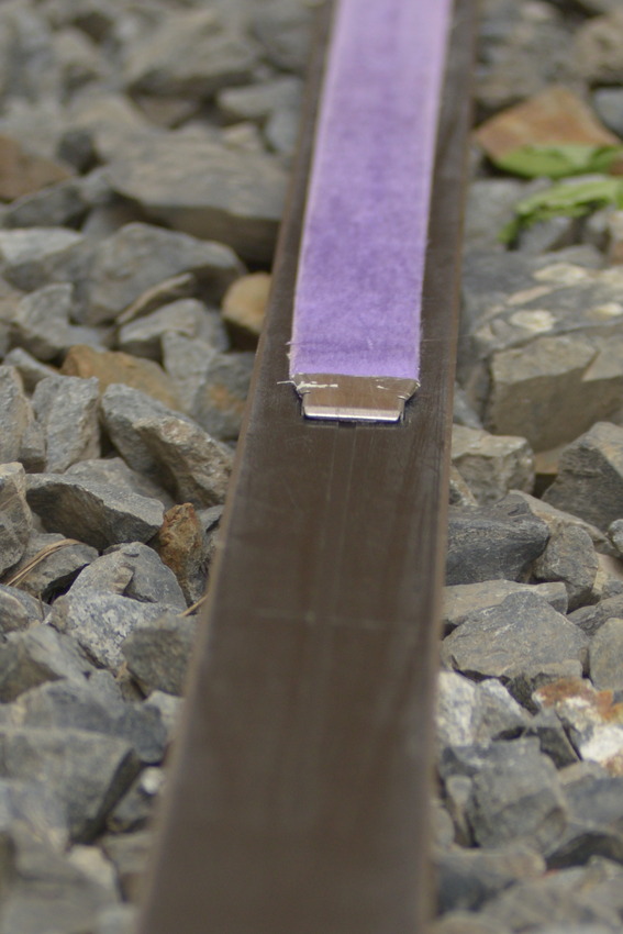 Detail na upnutí stoupacího pásu