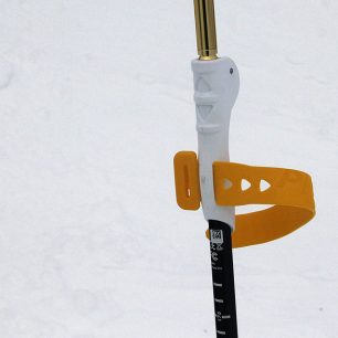 Detail rychloupínacího pásku a pomocné fixační rukojeti